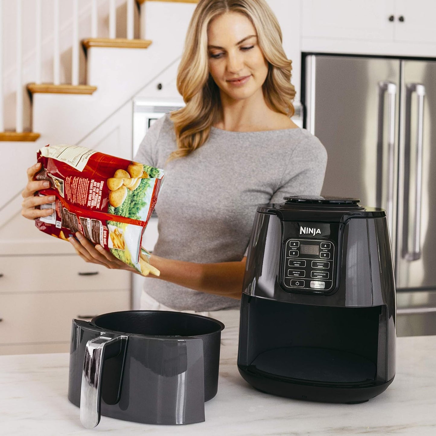 Ninja Air Fryer, 1550-Watt Programmable Base for Air Frying, Roasting, Reheating & Dehydrating with 4-Quart Ceramic Coated Basket (AF101), Black/Gray