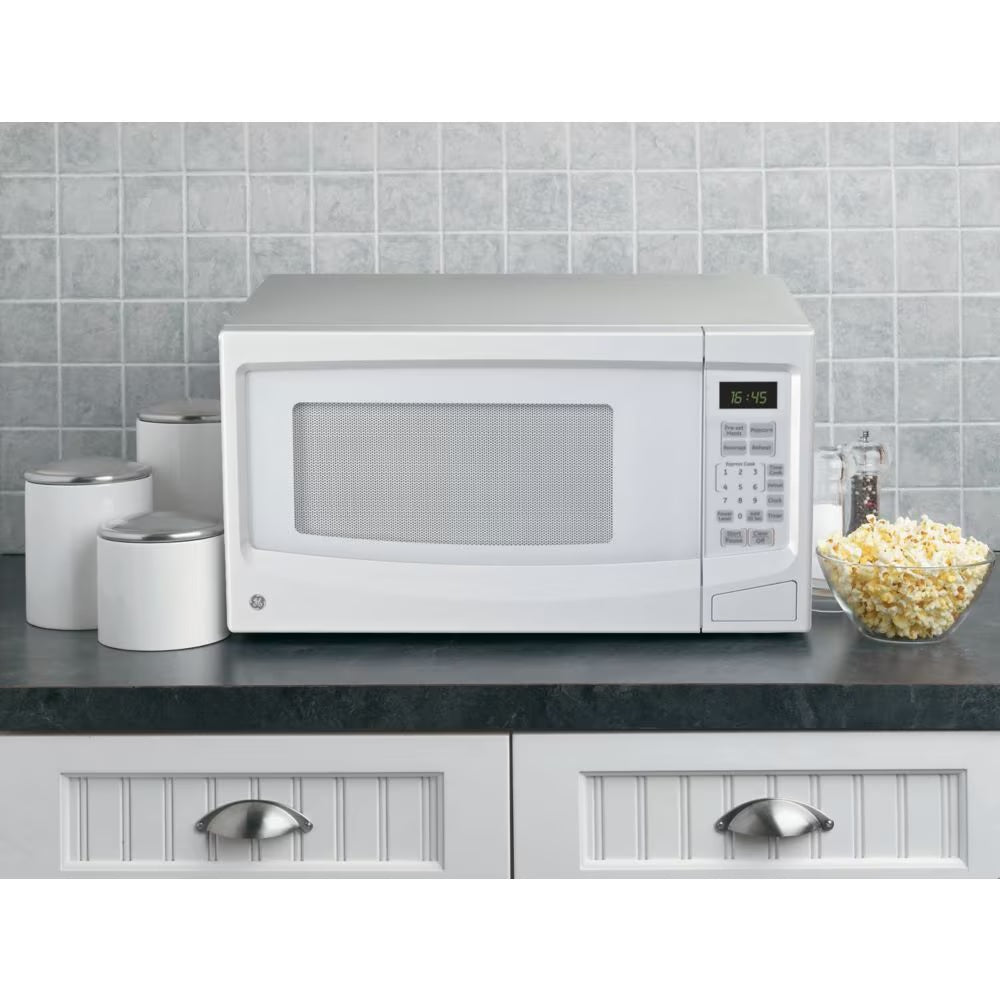 GE 1.1 cu. ft. Countertop Microwave Oven in White