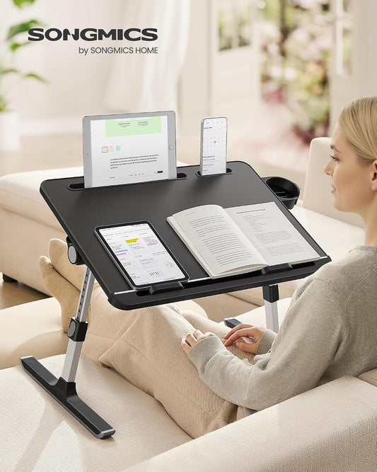 SONGMICS Bed Laptop Desk, Foldable Bed Desk for Laptop, 56 x 40 cm Large Desktop, 120° Stepless Tilt, Adjustable Height, Cup Holder, Tray, Portable Sofa Table, Ink Black ULLD113BC01