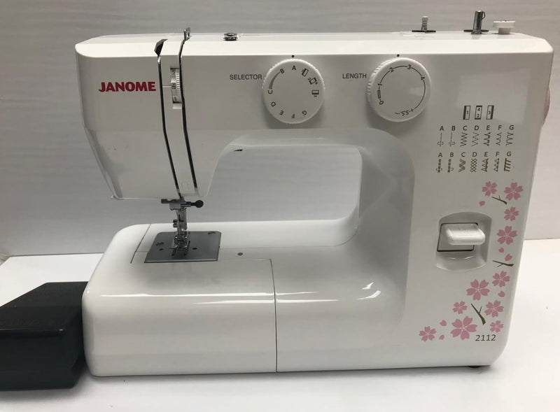 Janome 2112 Cherry Blossom Easy-to-Use Sewing Machine with 12 Stitches, Fully Adjustable Stitch Length and Width. Diamond Cut Feed Dogs for Easy Traction on all fabrics.