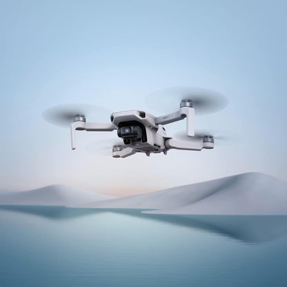 DJI Mini 4K Camera Drone Combo, Drone with 4K UHD Camera for Adults, Under 249 g, 3-Axis Gimbal Stabilization, 10km Video Transmission, Auto Return, 2 Batteries for 62-Min Max Flight Time, QuickShots