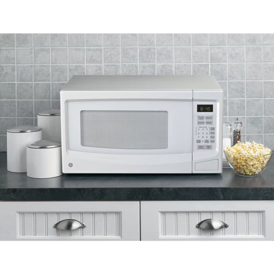 GE 1.1 cu. ft. Countertop Microwave Oven in White - PuriLite