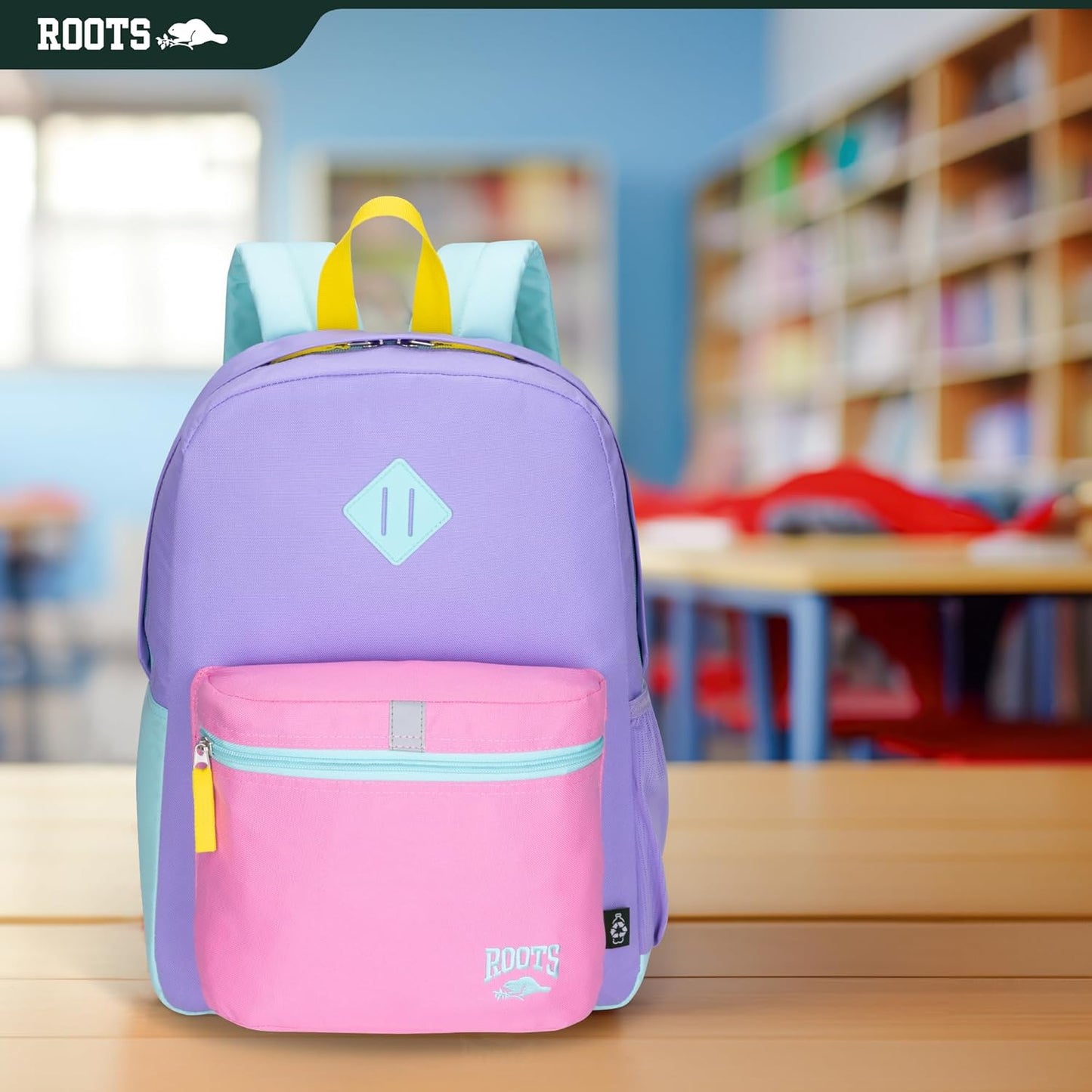 Roots Kids Lightweight Backpack — Made from 100% Recycled Fabrics with Rain Flap, Bottle Pocket, Reflective Accent, and Back Padding — 22.5 litres, Pink & Purple